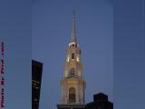 Dusk's Spire Rising Above Tall Buildings, Park St. Church