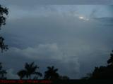 Sunset Lit Cloud Tops Underpinned by Thunderstorms