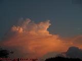 Crowd of Cloud Clowns Riding a Shelf of Sunset Fire