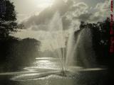 Fountain on Partly Cloudy Late Afternoon Sky, Parc Village