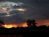 Sunset Fire Seen Through Localized Rainfall, Plantation