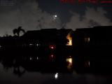 Waning Crescent Moon Peeking Above St. Tropez Apartments