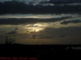 Sunset Light Piercing Darkened Clouds, Sunrise, Florida